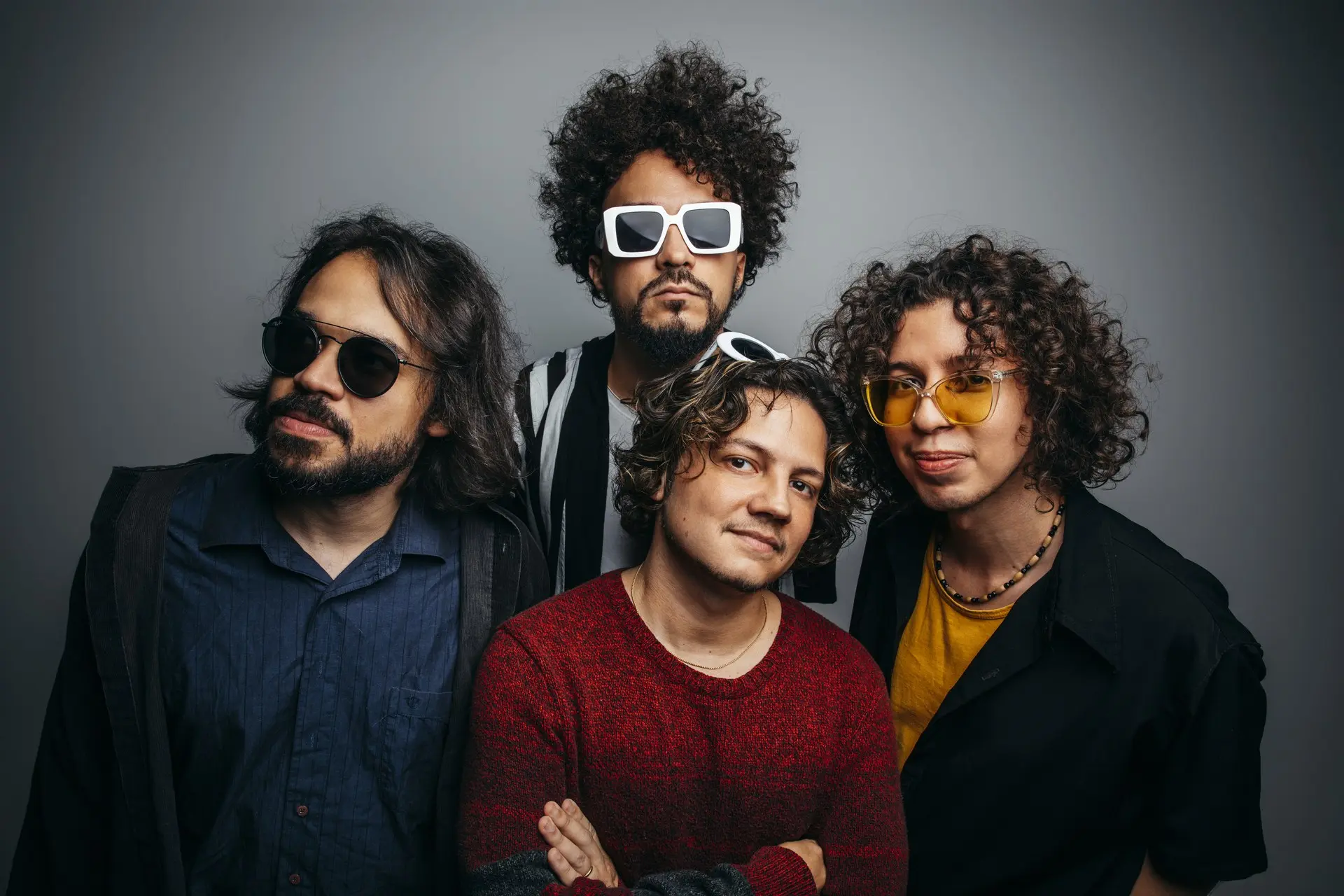 Os quatro integrantes da banda